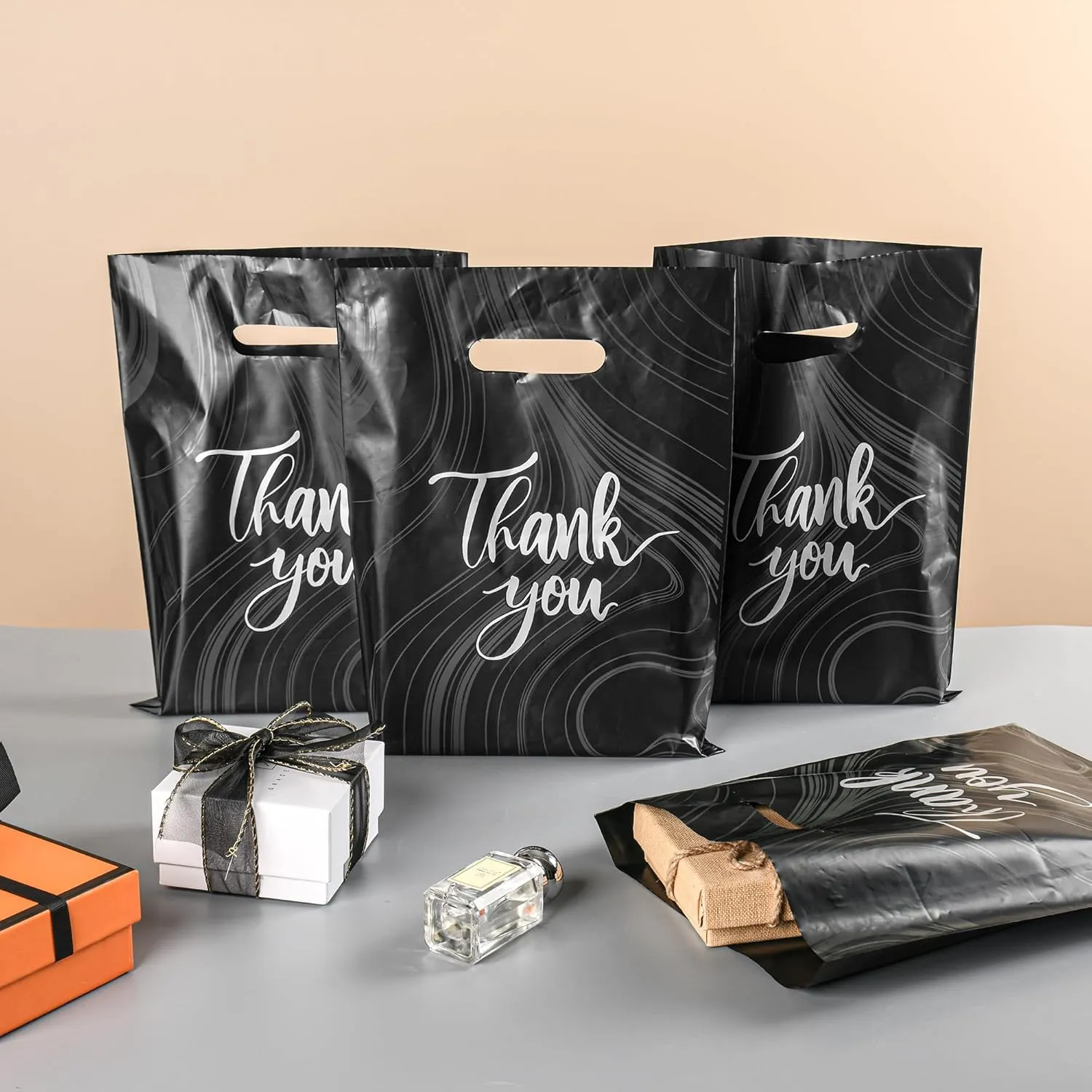 100 Pack Black Thank You Plastic Bags With Handles for Small Business, Merchandise Shopping, Packaging Supplies to Hold Clothes, Boutique, Retail - 9 X 12 Inches (2.36 Mil Thickness)
